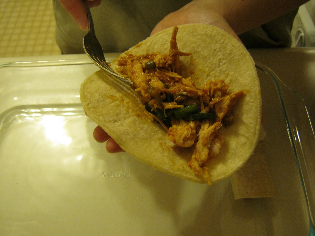 Chicken mix placed in tortilla