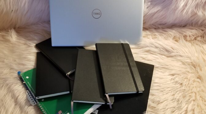 Writing books and Dell laptop